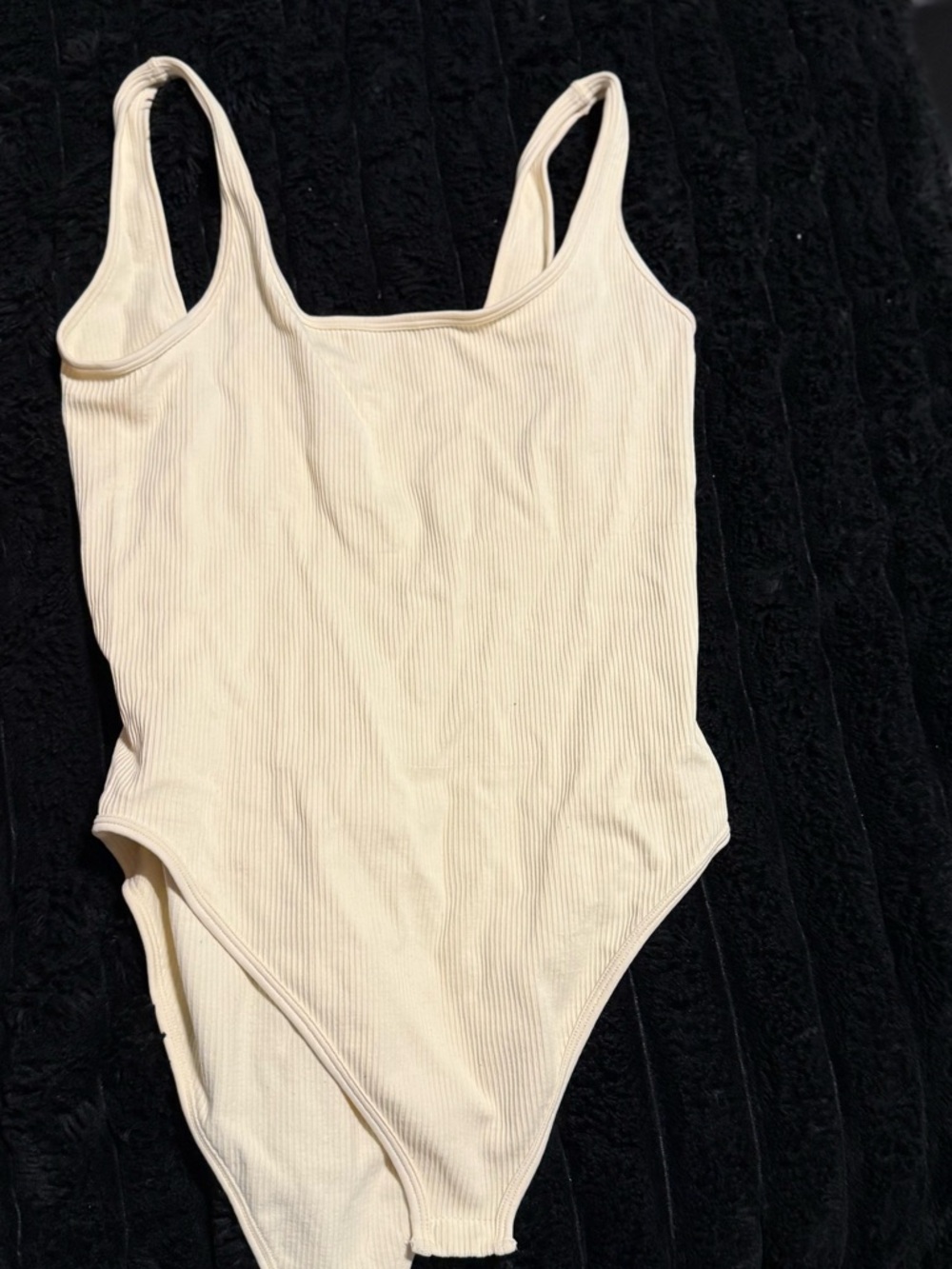 Women’s Ribbed One-Piece bodysuit in Cream